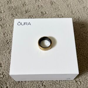 Oura Gold and Black Ring